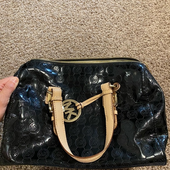 Michael Kors Black and Gold purse. - Picture 2 of 3